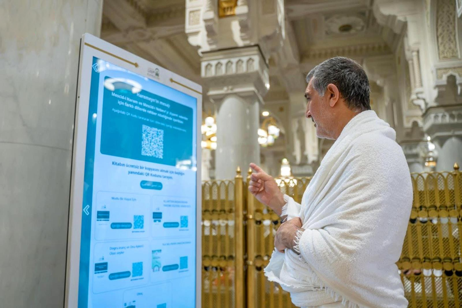 Saudi Arabia deploys AI robots at the Grand Mosque in Makkah and the Prophet’s Mosque in Madinah to guide pilgrims, answer questions and clean the holy sites. (AFP)